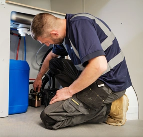 Technicians assembling specialist vehicle conversion interior