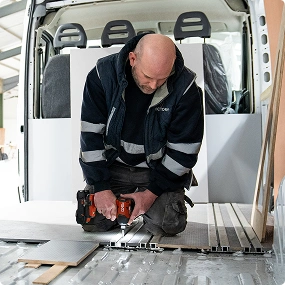 Victory Conversions team working on a converted vehicle